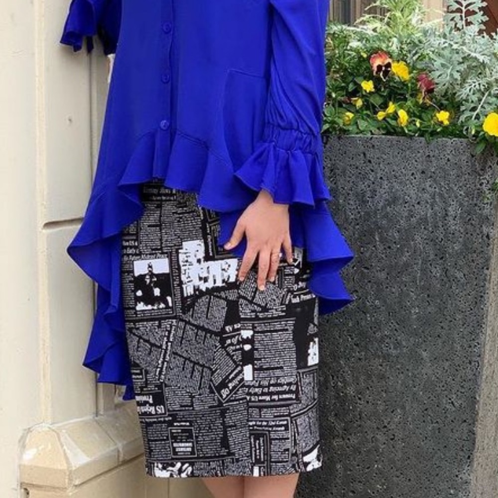 Black and white newsprint midi skirt.